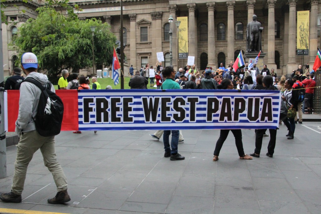 Free West Papua protesters gather at the Victorian State Library, photo Jarni Blakkarly