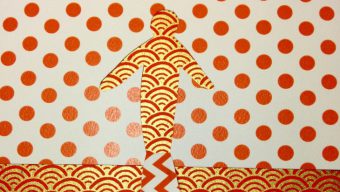 A collage in red, white and gold. The background is white with small red polkadots, and there is a cut out of a human-shaped figure using red and gold paper using the Japanese Seighaha pattern
